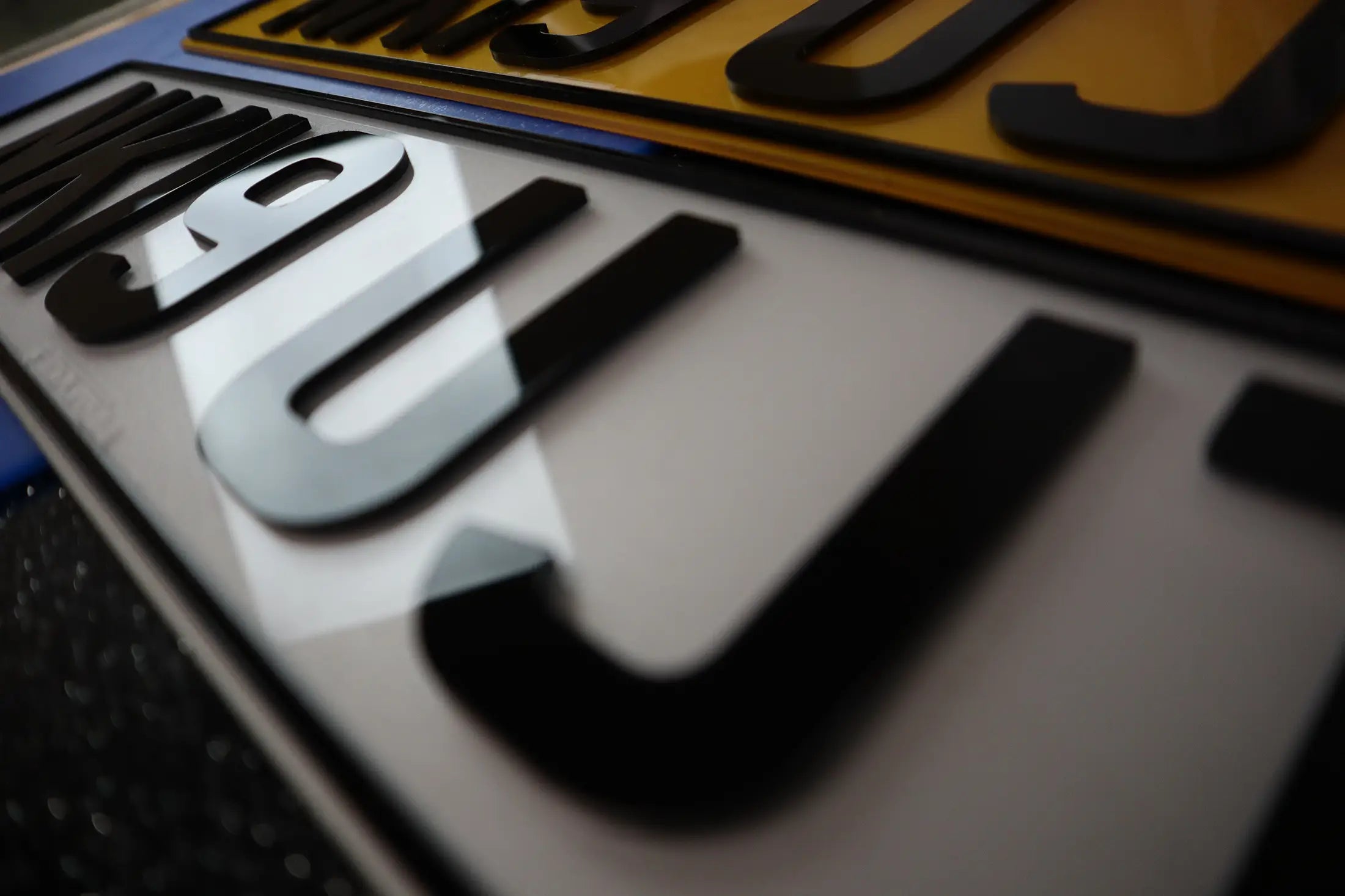 Striking Black Acrylic Plates with Sleek Matching Border LB15