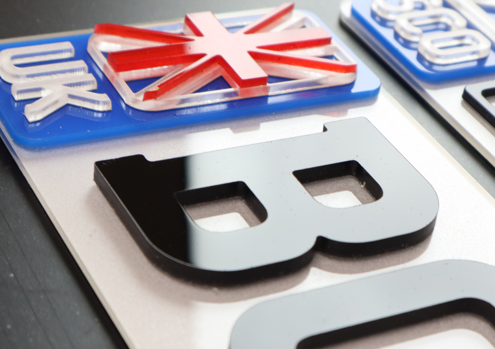 4D Flag Badged Lazer Cut Acrylic Number Plates