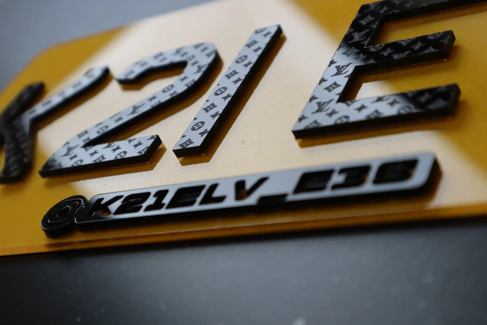 LV Tribute Plate for BMW E38 – Import Spec with IG Badge LB44