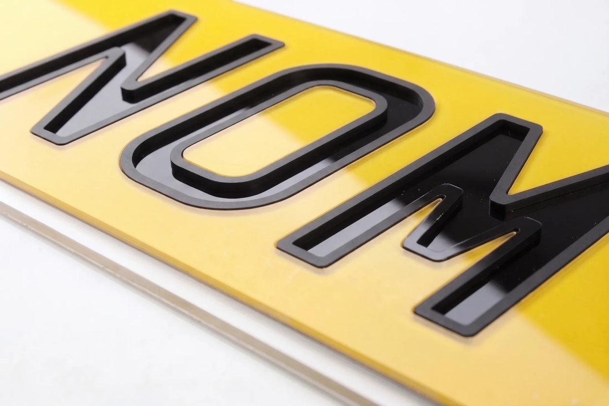 Negative Inset number plate lettering close up