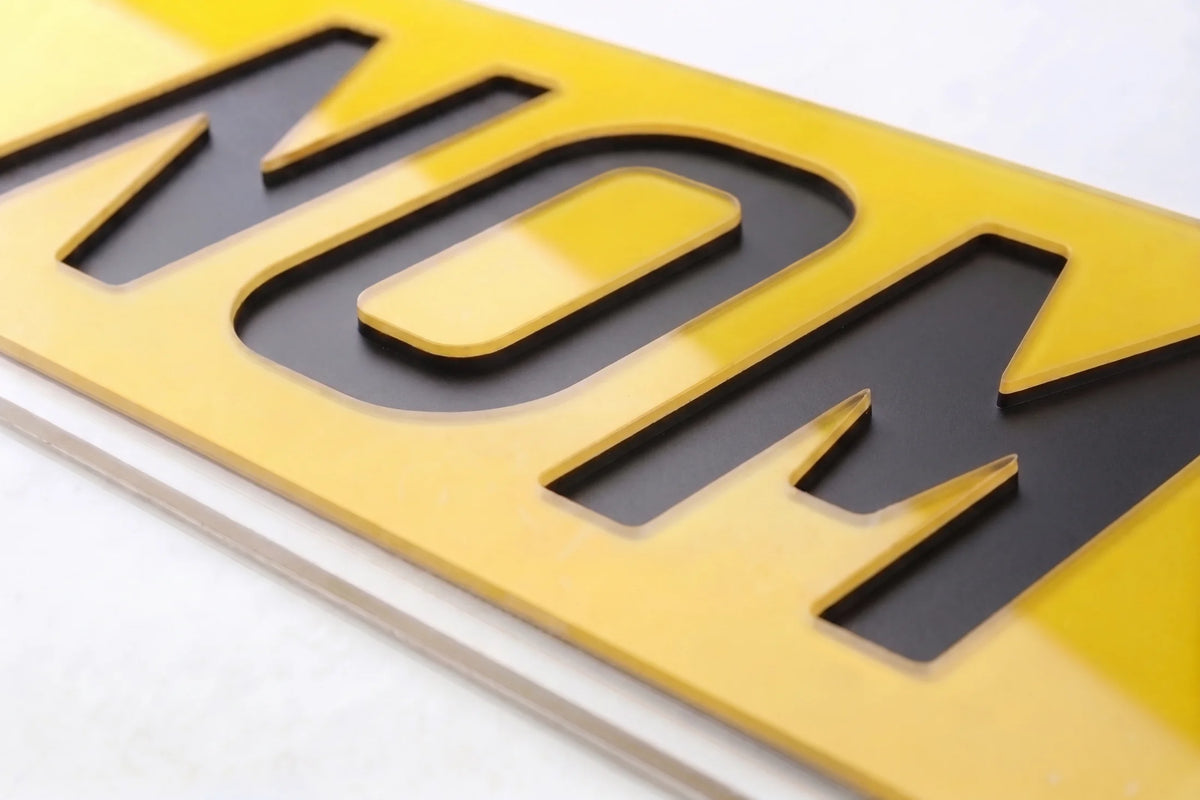 Negative Matte number plate lettering close up